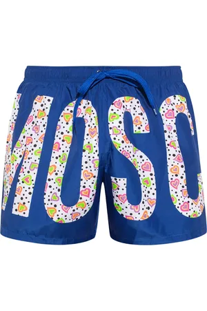 Moschino Blommönster logotyp ljusblå korta badshorts