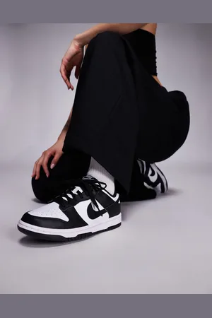 Nike – Dunk Low – Unisex – Vita och svarta sneakers