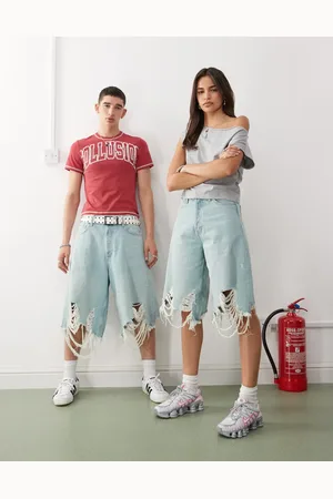 Weekday – , tvättade jeansshorts i extra oversize och unisex-modell med revor