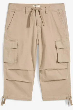 bonprix Stretchig cargobyxa med vida ben i 3/4-längd, Loose Fit
