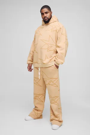 Boohoo Plus Oversize Mönstrad Träningsoverall Med Huva Och Utsvängda Ben