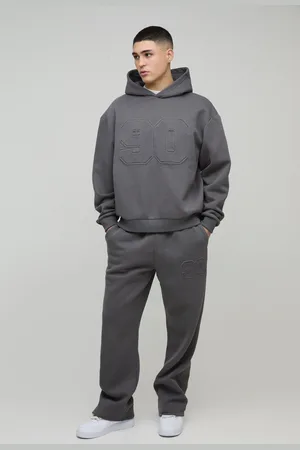 Boohoo Oversize Träningsoverall Med Huva Och Tryck I Varsitystil