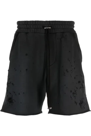AMIRI Shotgun shorts med slitning