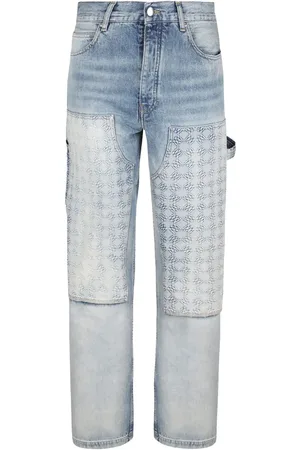 AMIRI Jeans med präglat monogram
