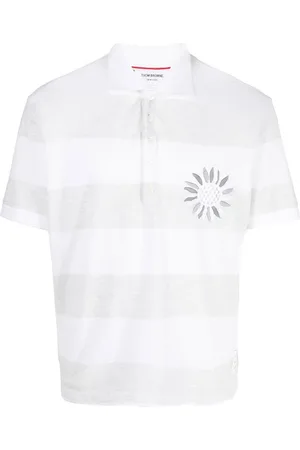 Thom Browne Randig pikétröja med blomsterbrodyr