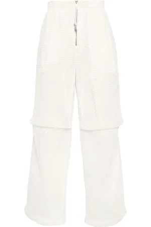 Jil Sander Glesstickade byxor med lagerdesign