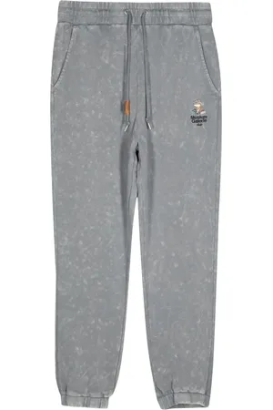 Musium Div. Trackpants med broderad logotyp