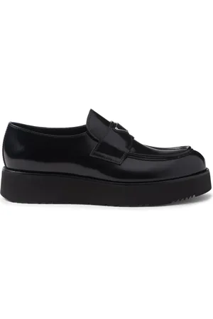 Prada Loafers med logotypplakett