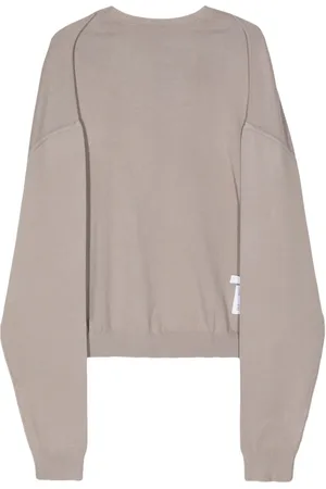 Rokh Stickad cape med logotyp