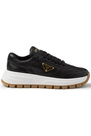 Prada Lädersneakers med triangelformad logotyp