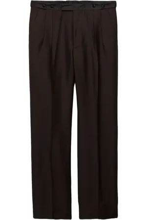Prada Plisserade byxor med vida ben