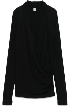 Totême överlappad blus i jersey