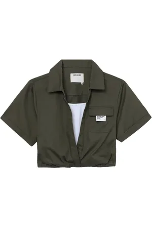 Musium Div. Skiktad topp med logotyp