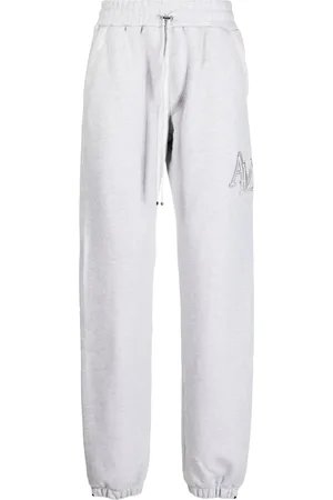 AMIRI Staggered sweatpants med broderad logotyp