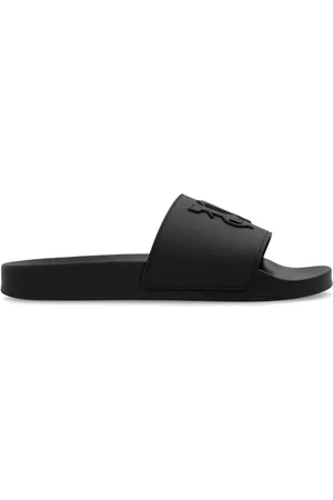 Palm Angels Tofflor med präglat monogram