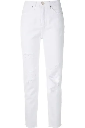 Olympiah Jeans med slitning