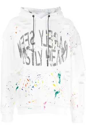MOSTLY HEARD RARELY SEEN Sliten hoodie med färgstänk