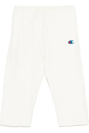 UNDERCOVER X Champion logo
