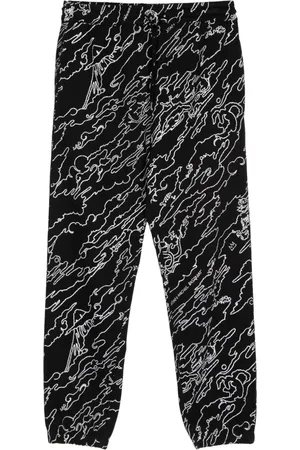 Maharishi Maha Basquiat trackpants med avsmalnande ben