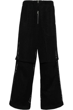 Jil Sander Glesstickade byxor med lagerdesign