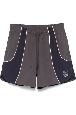 PUMA X KidSuper shorts med logotyp
