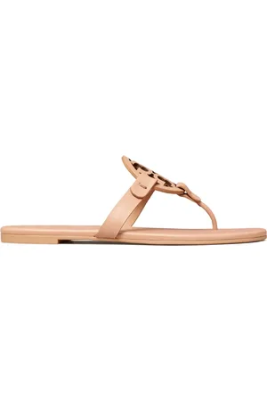 Tory Burch Tofflor med logotypplakett