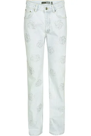 ROTATE Jeans med nitar