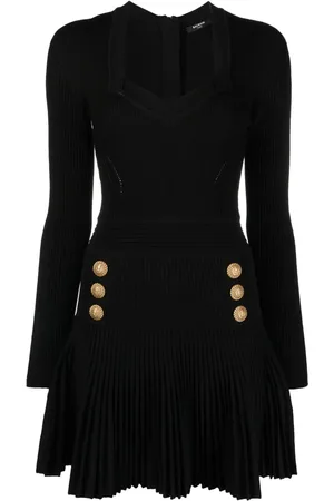 Balmain Utsvängd ribbstickad klänning