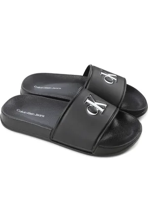 Calvin Klein Tofflor med logotyp