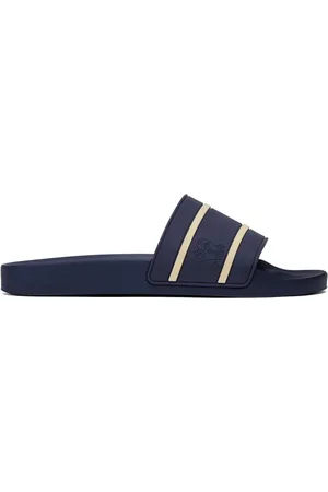 Brunello Cucinelli Tofflor med präglad logotyp