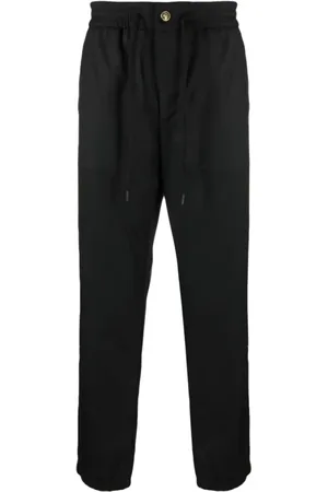 VERSACE Byxor, Herr, S, Polyester, Svarta Avslappnade Byxor Polyester Viskos