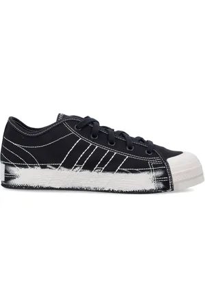 Y-3 Skor, unisex, 43 1/2 EU, Mocka, Svarta canvas sneakers med handmålad mellansula