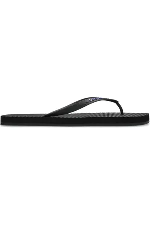 Dsquared2 Skor, Herr, 42 EU, Svart Logotyp Präglad Slip-On Sandaler