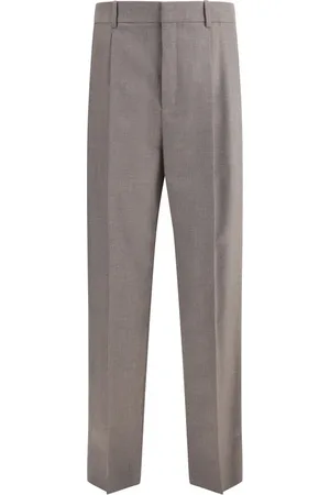 Saint Laurent Byxor, Herr, M, Elegant Wool Carotte Byxor med Fickor
