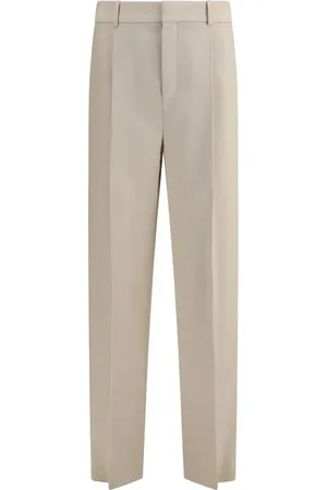 Saint Laurent Byxor, Herr, M, Elegant Wool Carotte Byxor med Fickor