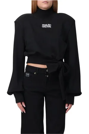 VERSACE Stickade tröjor & koftor, Dam, XS, Bomull, Svart Stickad Sweatshirt med Knut i Midjan