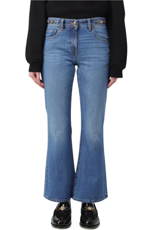 VERSACE Jeans, Dam, W28, Bomull, Elegant Blå Flared Jeans med Medusa Midjeband