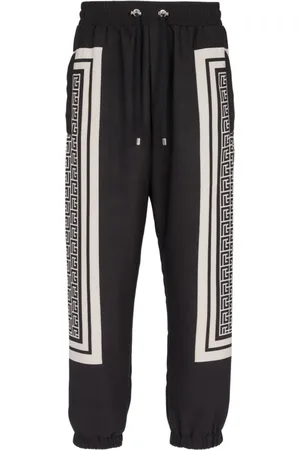 Balmain Byxor, Herr, L, Polyester, Monogrammönstrade Joggingbyxor med Scarf-detaljer