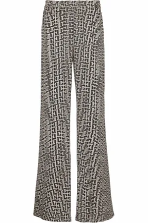 Balmain Byxor, Herr, S, Monogrammönstrade flödande byxor