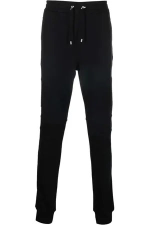 Balmain Byxor, Herr, S, Bomull, Svarta bomullsjoggingbyxor med flocktryck