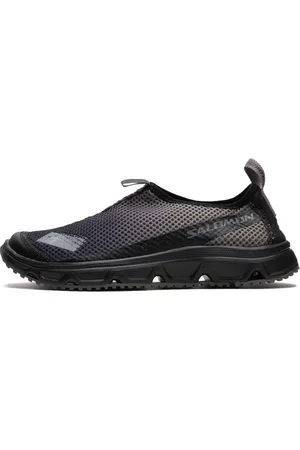 Salomon Skor, unisex, 38 1/2 EU, Läder, Lätta Svarta Slip-On Skor