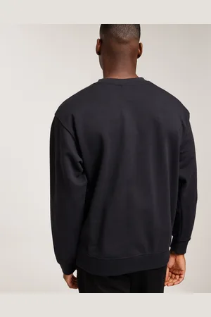 New Balance Small Logo French Terry Crew Sweatshirts